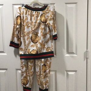 Elegant Gold and Black Pantsuit with Sporty Accents